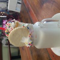Vanilla Milkshake · Comes with vanilla cupcake, a sugar cookie, whipped cream and sprinkles. (sauces and treats ...