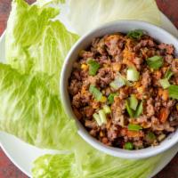 Lettuce Wraps · Ground black hill ranch pork, local cabbage, carrots, mushrooms, garlic, green onions, roast...
