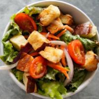 Cobb Salad · Iceberg lettuce, turkey, avocado, bleu cheese, roasted corn, bacon, tomato and soft boiled e...