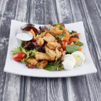 Buffalo Chicken Salad · Fresh mixed greens, carrots, onions, croutons, tomatoes, hard-boiled egg topped with our nak...