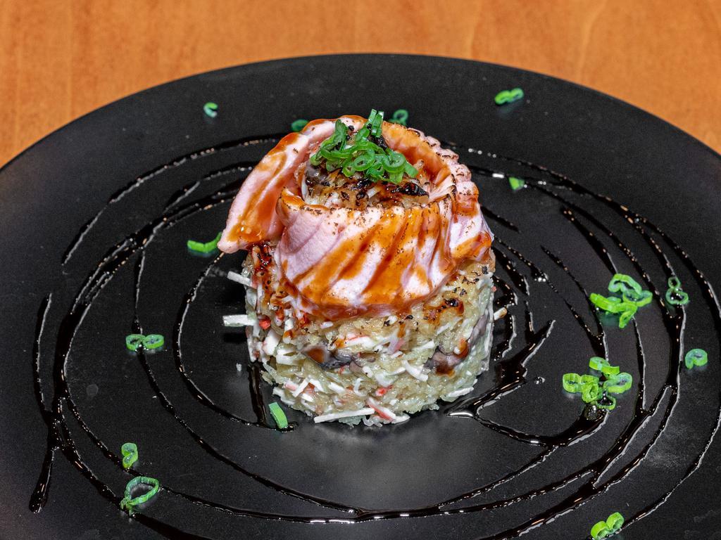 Salmon Ball · Mixed crabstick, avocado, and shitake mushroom on the bottom with a layer of torched salmon, eel sauce, and scallion on top.
