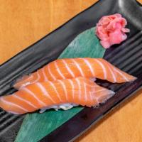 Sake Don · Sliced raw salmon over a bed of seasoned rice. Served with miso soup.