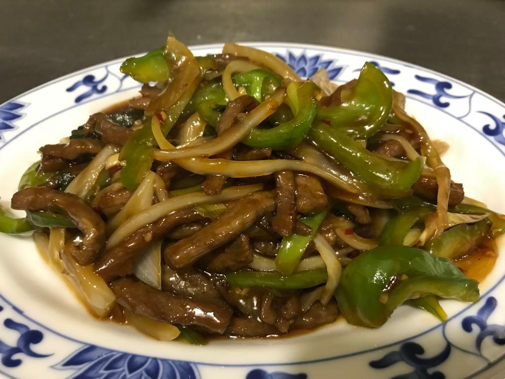 618. Beef Thai Basil · Bell pepper and onions. Spicy.