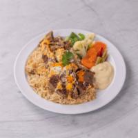 Lamb Plate · Lamb slices, rice, tzatziki sauce, hummus and salad.