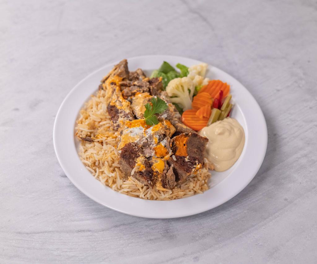 Lamb Plate · Lamb slices, rice, tzatziki sauce, hummus and salad.