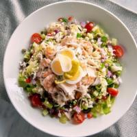 Seafood Chopped Salad · Crabmeat, shrimp, feta cheese and Greek vinaigrette.