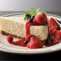 New York Style Cheesecake · Seasonal garnish.