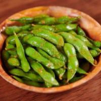 Garlic Edamame. · Boiled soy beans cooked with garlic.