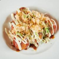 Takoyaki. · Octopus fritters, mayo and bonito flakes