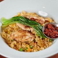 Chicken Chashu Fried Rice. · Chicken Chashu, Rice, Egg, Mixed Veggies, Sesame Seeds, and Baby Bok Choy with Fried Chili O...