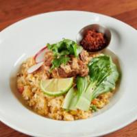 Carnitas Fried Rice. · Housemade Carnitas, Egg, Mixed Veggies, Bean Spourts, Napa Cabbage, Mushrooms, Chives, Sesam...