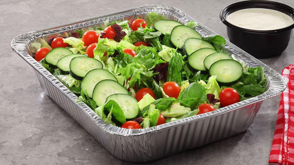 Garden Salad (Party (Serves 8-10)) · A delightful mix of romaine, iceberg and tender spring mix lettuces topped with cherry tomatoes, cucumbers and croutons plus your choice of dressing.