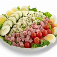 Cobb Salad (Family (Serves 4-6)) · A delightful mix of blue cheese crumbles, ham, cherry tomatoes, cucumbers and hard- boiled e...