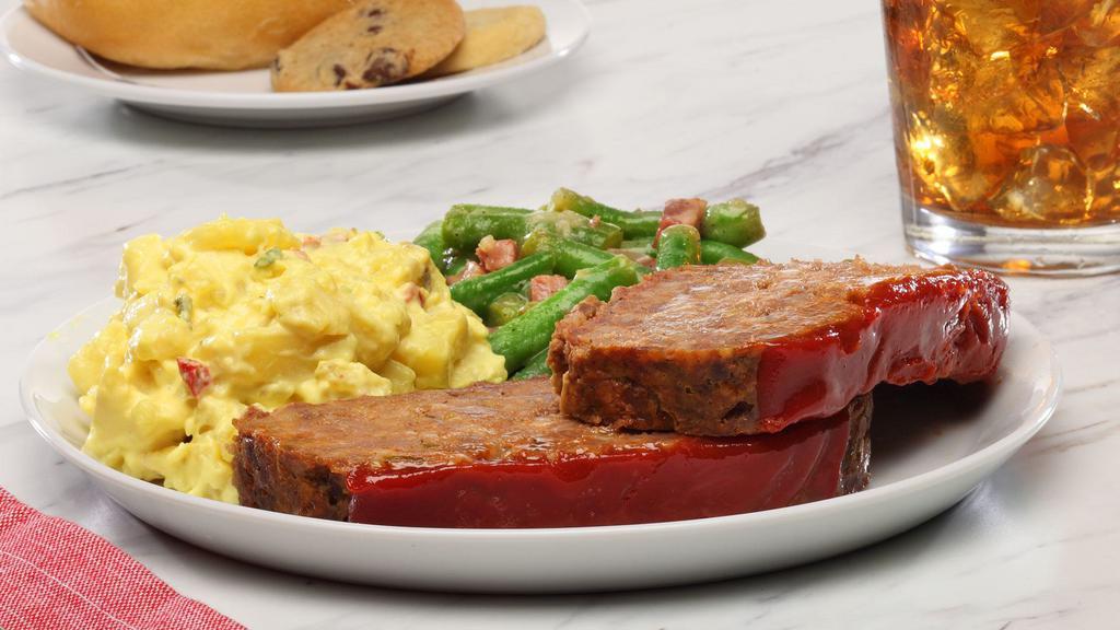 Meatloaf · Grandma's recipe made daily with delectable mix of ground beef and pork.