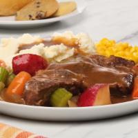 Pot Roast · Our Pot Roast is slow cooked overnight for awesome tenderness. Served on a bed of potatoes, ...