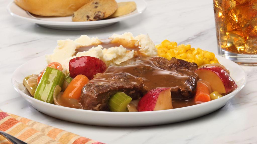 Pot Roast · Our Pot Roast is slow cooked overnight for awesome tenderness. Served on a bed of potatoes, carrots, onions, celery and gravy.