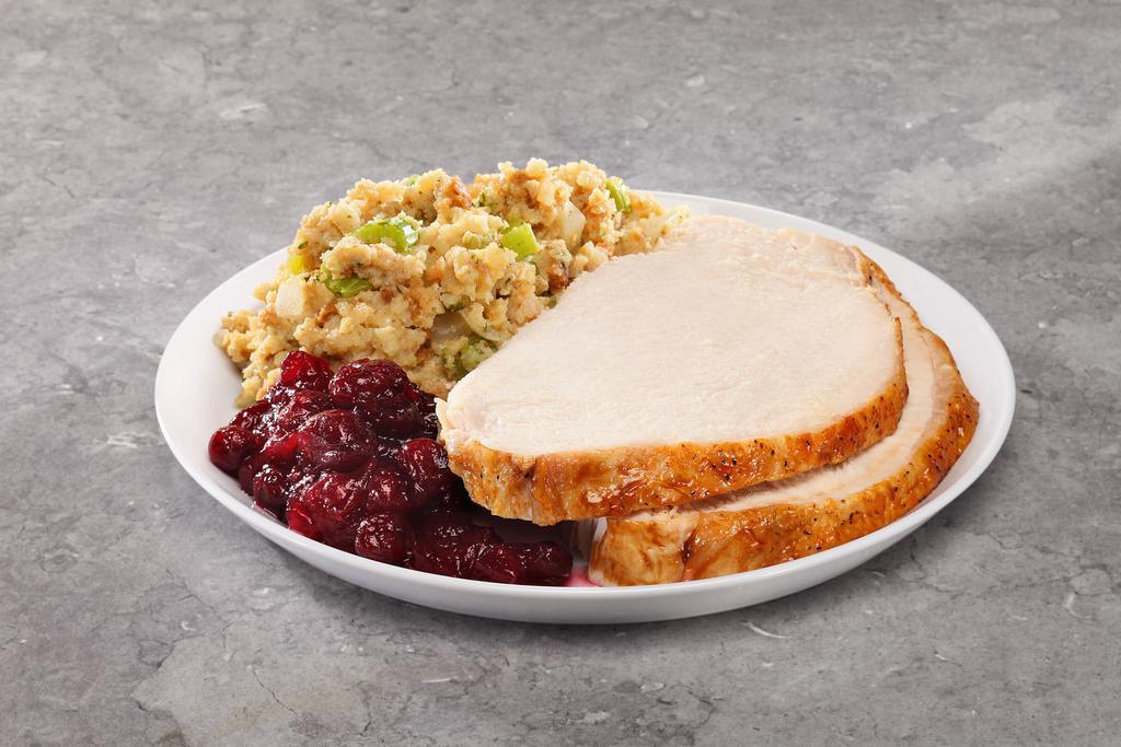 Holiday Sliced Turkey Meal · Includes sliced turkey, gravy, cranberry sauce, two sides, yeast rolls, and cookies.