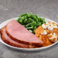 Holiday Sliced Ham Meal · Includes sliced Holiday Spiced ham, two sides, yeast rolls, and cookies.