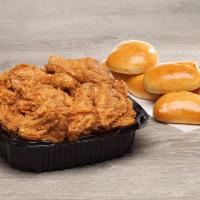 12 Piece Family Box · 12 pieces of white and dark meat paired with your choice six fluffy yeast rolls OR six flaky...