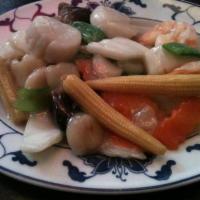 Seafood Platter Delight · A combination of squid, fish, shrimp, crab meat and scallops sauteed with mix garden vegetab...