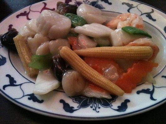 Seafood Platter Delight · A combination of squid, fish, shrimp, crab meat and scallops sauteed with mix garden vegetables.