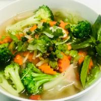 P4. Pho Rau · Pho with mixed veggies. Includes choice of broth, flat rice noodles, garnished with mixed on...