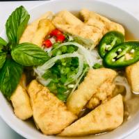P5. Pho Tofu · Pho with tofu. Includes broth, flat rice noodles, garnished with mixed onions, cilantro and ...