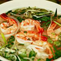 P7. Pho Tom · Pho with shrimp. Includes broth, flat rice noodles, garnished with mixed onions, cilantro an...