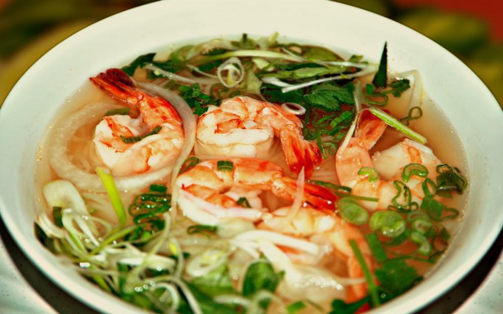 P7. Pho Tom · Pho with shrimp. Includes broth, flat rice noodles, garnished with mixed onions, cilantro and served with bean sprout, basil, lime wedge and slices of jalapenos on the side. Gluten free.
