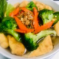 P9. Pho Chay · Vegan pho. Pho with vegan broth, rice noodles, tofu and mixed veggies. Includes broth, flat ...