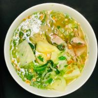 F1. Mi Hu Tieu Nuoc · Chicken-pork base soup with BBQ pork, pork sausage slices, prawns and choice of rice noodles...