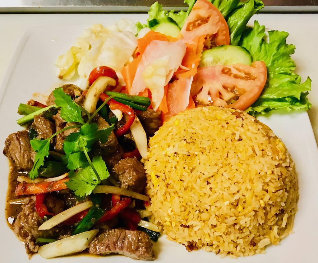 X6. Bo Luc Lac · Shaking beef. Wok-seared beef tenderloin cubes in our special soy pepper and wine sauce with onion, red bell pepper served with Sriracha fried rice, pickled veggies and tomato slices.