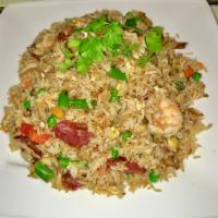 Fr5. Combination Fried Rice · Shrimp, BBQ pork, Chinese sausage, carrot, green bean, corn and egg.