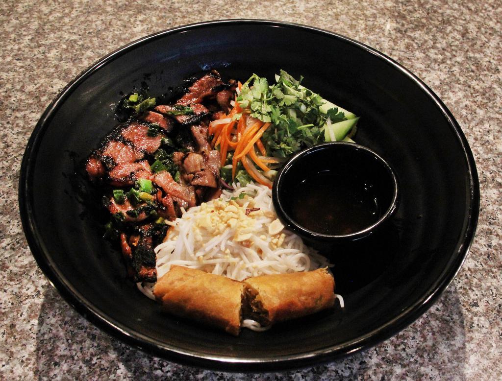 B1. Thit Nuong Cha Gio Bowl · Grilled pork. Thin-sliced charbroiled pork and egg roll. Includes vermicelli rice noodles, diced iceberg green leaf lettuce, cabbage, bean sprout, cucumber, pickled julienned carrot and daikon radish, topped with crushed peanuts and scallion.