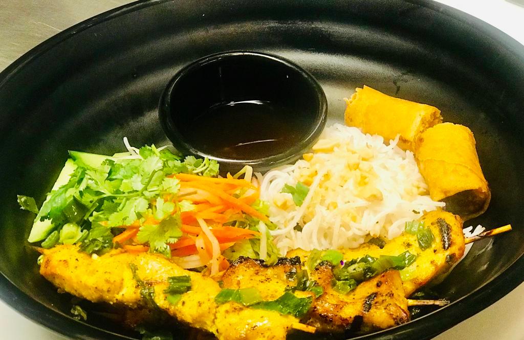 B2. Ga Nuong Bowl · Grilled chicken. Charboiled chicken skewers and an egg roll. Includes vermicelli rice noodles, diced iceberg green leaf lettuce, cabbage, bean sprout, cucumber, pickled julienned carrot and daikon radish, topped with crushed peanuts and scallion.