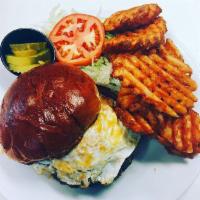 Chorizo Burger · Cheddar cheese and topped with over easy egg. Comes with lettuce, tomato and pickle. Served ...