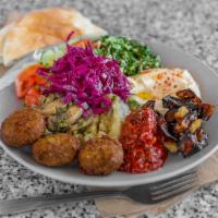Small Mezze Vegetarian Feast · All made in house!

Hummus.
Tabouli.
Fried eggplant.
Eggplant salad.
Spicy Turkish Sauce.
Ma...