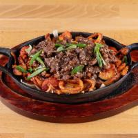 4. Spicy Bulgogi and Squid · Served with vegetables.