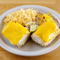 Pollo Fundido · A golden crisp chicken burro topped with cream cheese and melted cheese. Served with rice an...