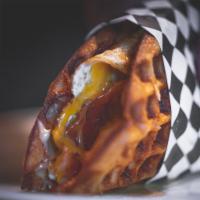 Meat Joe Wafflewich · Your choice of bacon or sausage, fried egg, and Cheddar cheese with a rich Vermont maple cre...