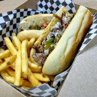 Philly Cheese Steak · Thinly- sliced steak, grilled onions, bell peppers, provolone cheese, and roasted garlic may...