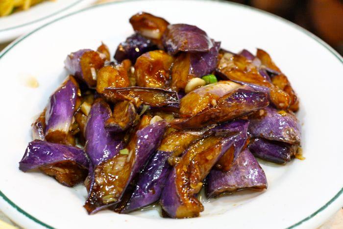 73. Eggplant with Garlic Sauce · With steamed rice. Hot and spicy.