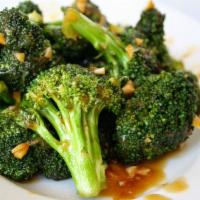 74. Broccoli with Garlic Sauce · With steamed rice. Hot and spicy.