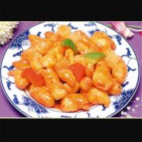 84. Sweet and Sour Chicken · With steamed rice. 