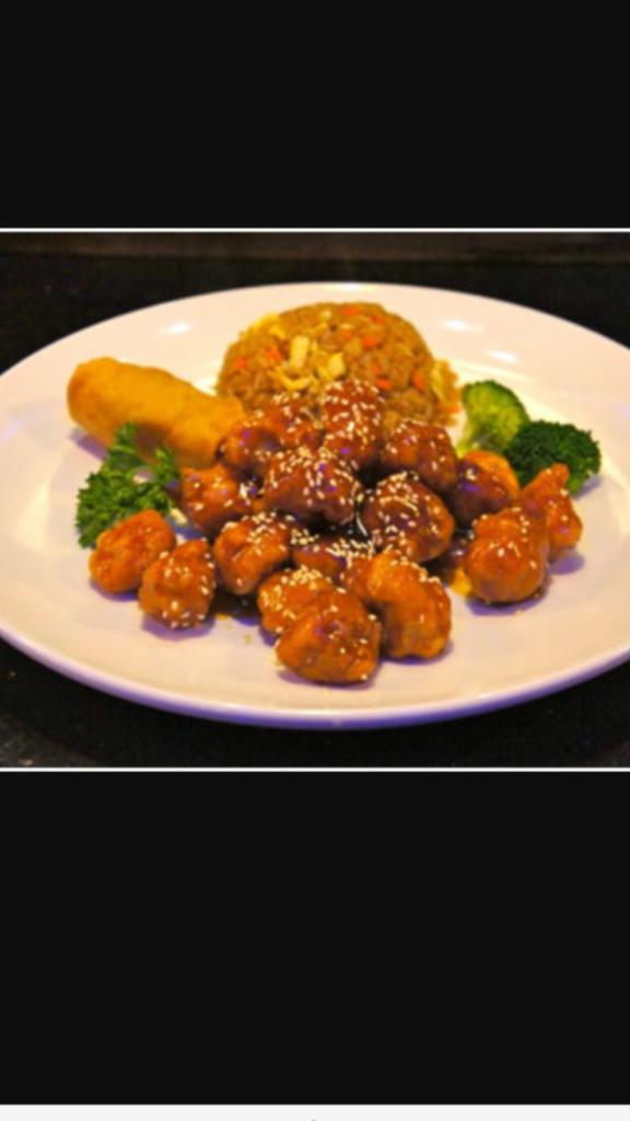 C22. Sesame Chicken Combination Platter · Served with egg roll and pork fried rice.