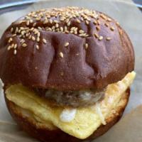Brioche Breakfast Sandwich · on Splitbake House brioche bun, egg patty & melted cheese with your choice of bacon or glute...