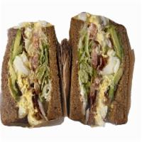 Cobb Salad Sandwich · Bacon, avocado, egg salad, lettuce, tomato, and mayonnaise on choice of slice bread.