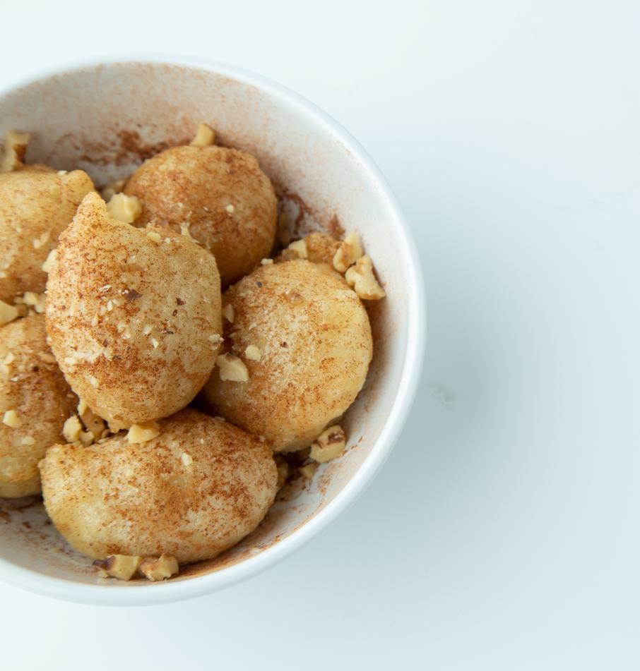 Loukoumades · Greek style beignets topped with honey syrup and cinnamon.