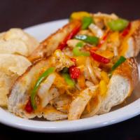 11. Cajun Chicken Sandwich · Chicken breast dusted with Cajun spices, sauteed onion, mixed bell peppers, cheddar cheese a...