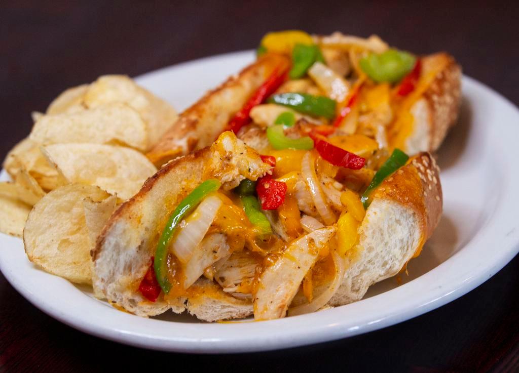 11. Cajun Chicken Sandwich · Chicken breast dusted with Cajun spices, sauteed onion, mixed bell peppers, cheddar cheese and mayo.